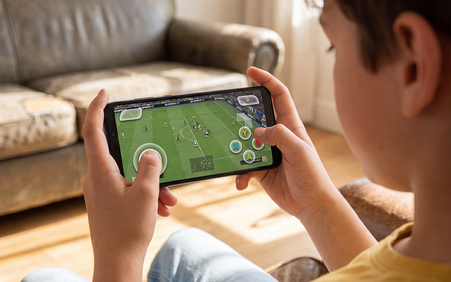 On-screen virtual controls · phone playing EA Sports FC with overlay D-pad and action buttons